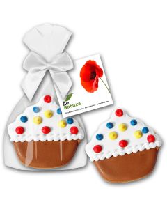 Muffinförmiger Keks als Cupcake Cookie mit Karte am Säckchen befestigt als Werbung zu Ostern