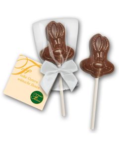 Schokololly als Hasenkopf am Stiel mit Schleife und Karte